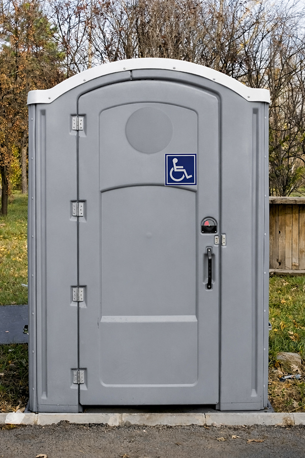 ADA accessible portable toilet at outdoor event